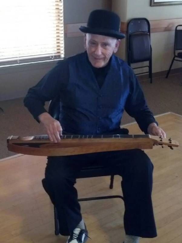 A man playing the dulcimer. Next Avenue