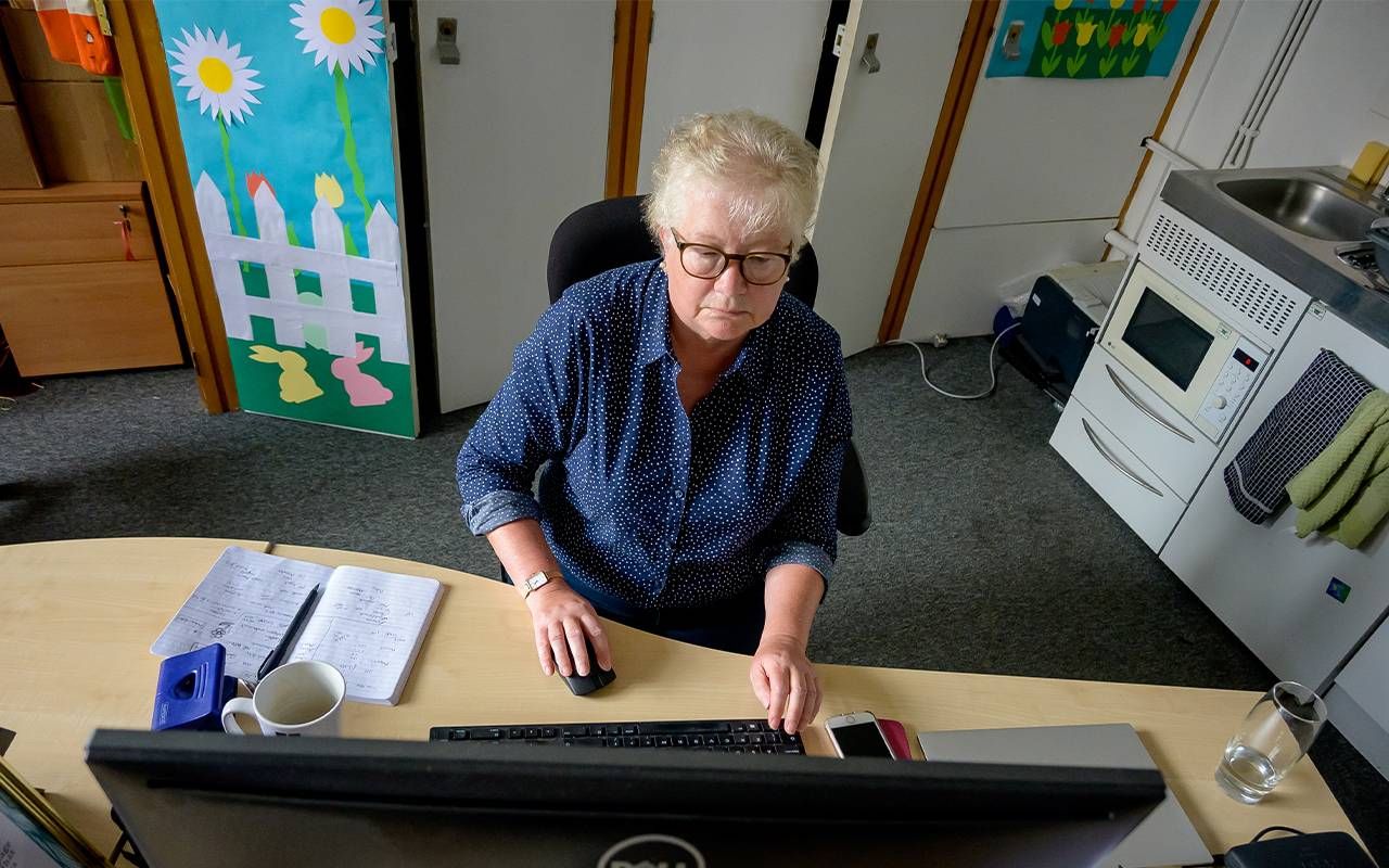 A woman over 50 at work. Next Avenue, older workers, ageism at work