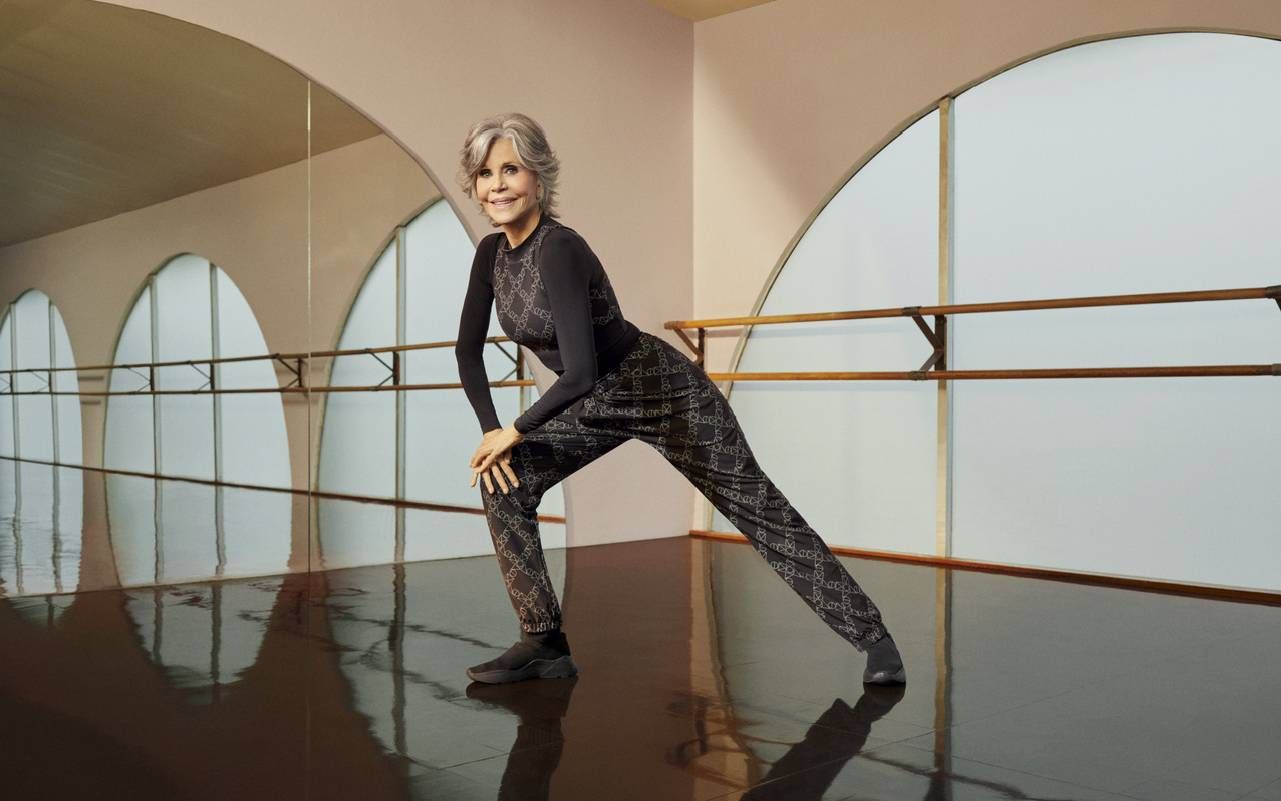 Jane Fonda stretches in a dance room.  Next Lane, adaptive furniture disabled adults