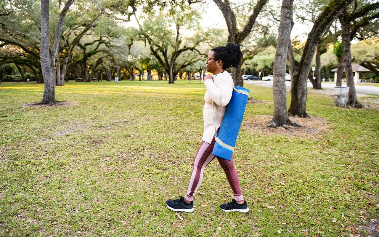 A woman walking outside and getting 30 minutes of exercise. Next Avenue, frailty index, frailty index, liver frailty index