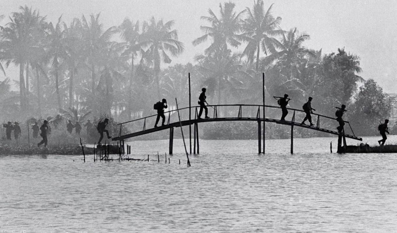 A black and white photo of soldiers in Vietnam. Next Avenue, PTSD, Vietnam war, veterans