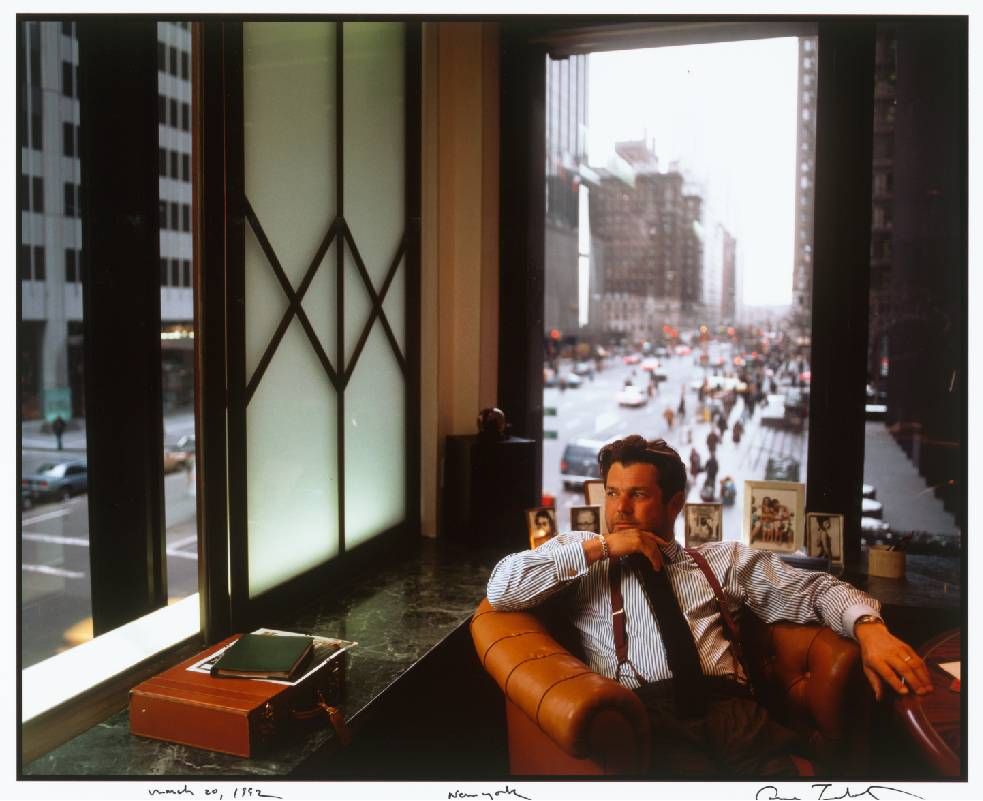 A man looking out of the window in an office. Next Avenue, Jan Wenner, Rolling Stone, book
