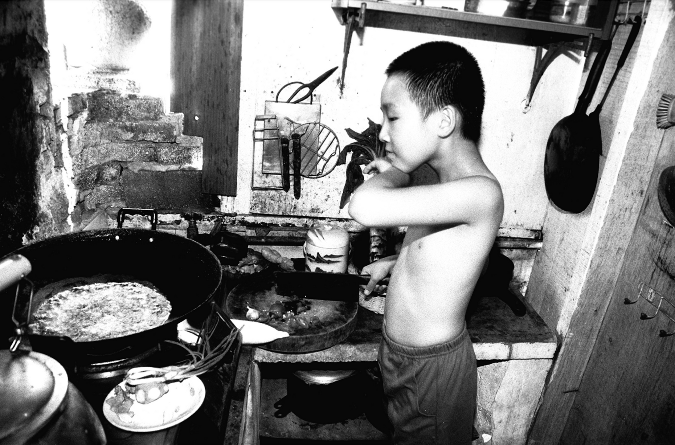 Martin Yan in his home kitchen at nine-years-old