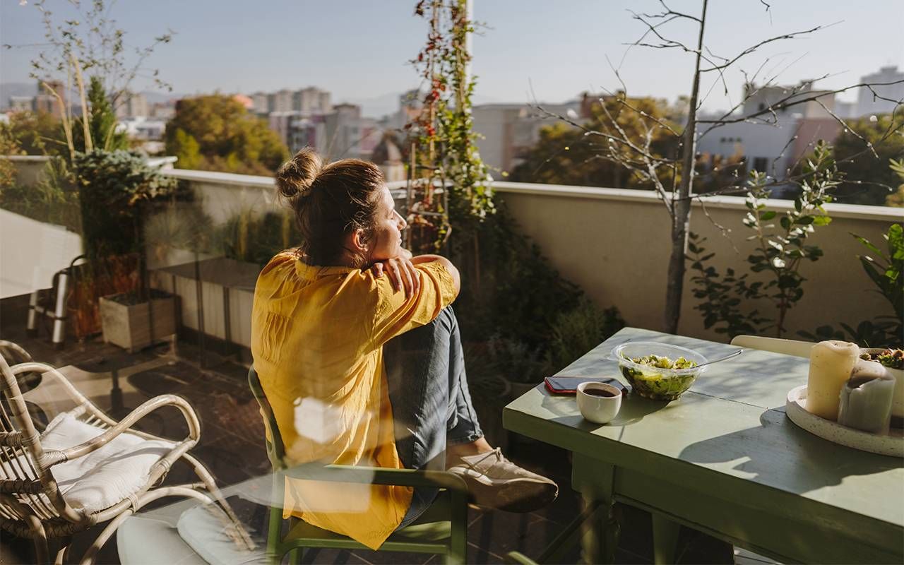 A family caregiver sitting in the sun and taking a break. Next Avenue, family caregiver