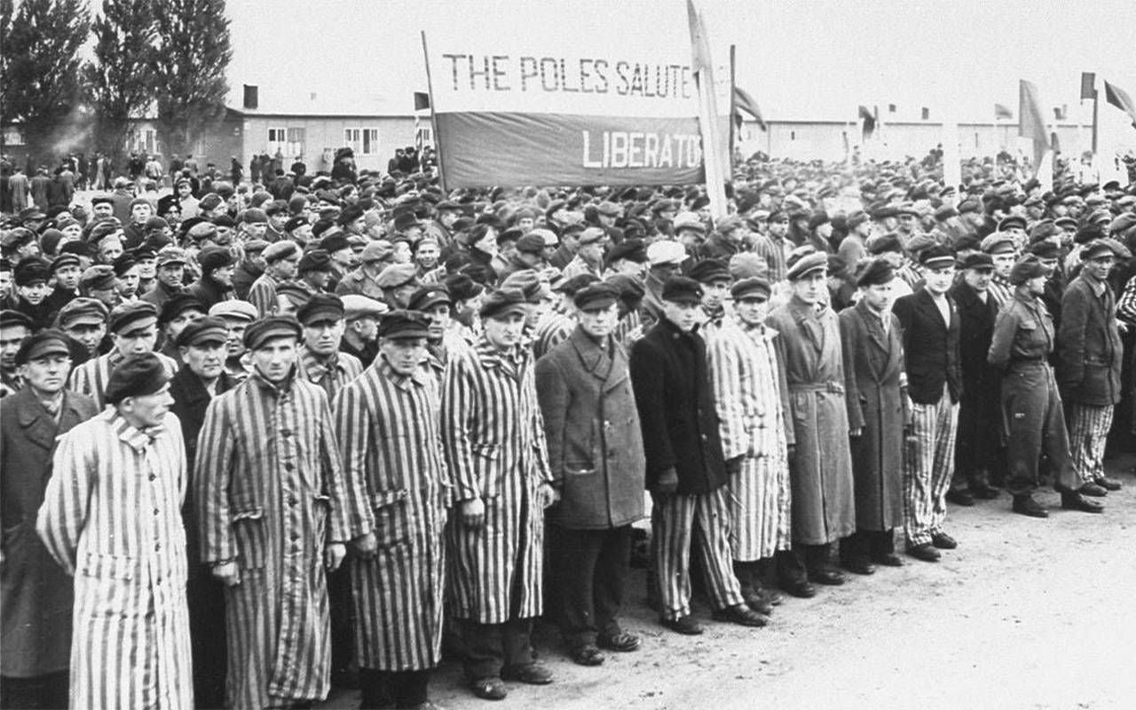 A black and white photo of holocaust survivors. Next Avenue, International Holocaust Remembrance Day