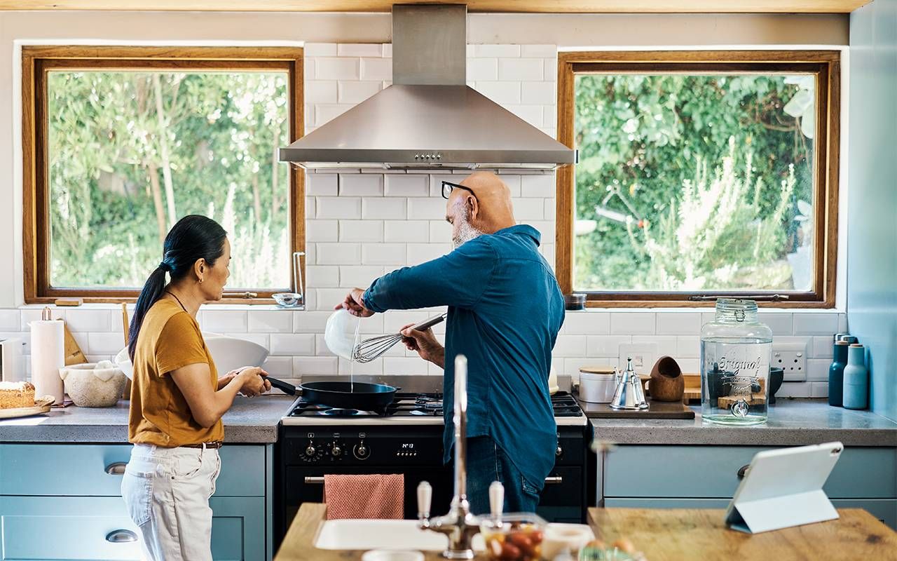 Empty nesters at home making breakfast. Next Avenue