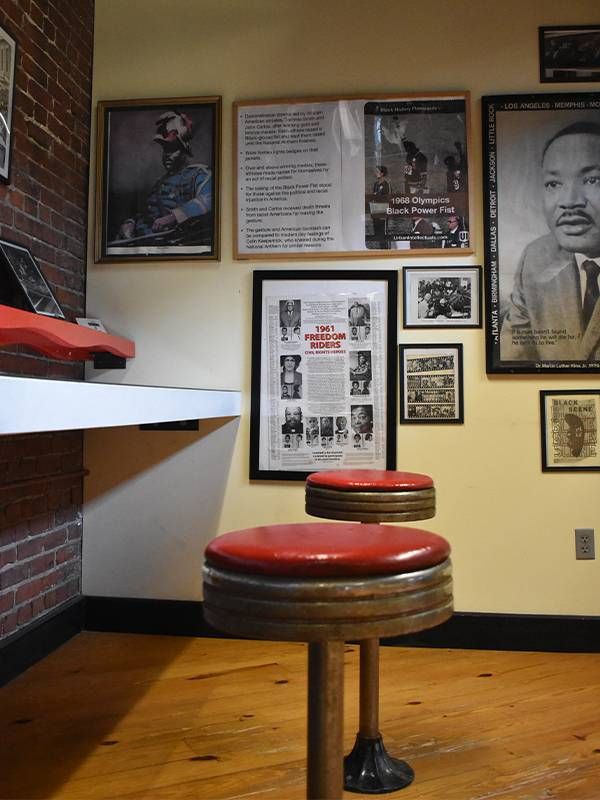 Two vintage looking stools. Next Avenue, Roots 101 Museum