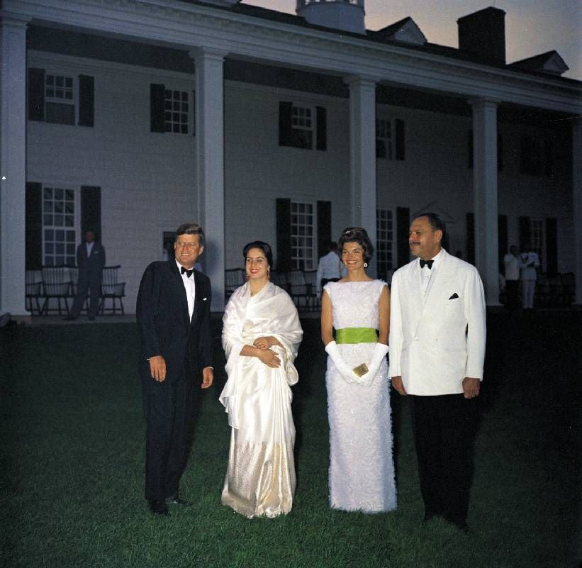 Four people posing outside of Mount Vernon. Next Avenue, Dinner with the President, Alex Prud'homme