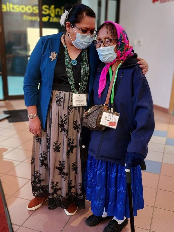A caregiver standing with her grandmother. Next Avenue, Navajo Caregivers