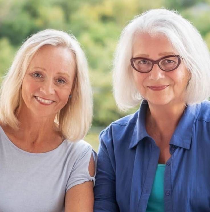 Two women smiling outside. Next Avenue, postmenopausal women health
