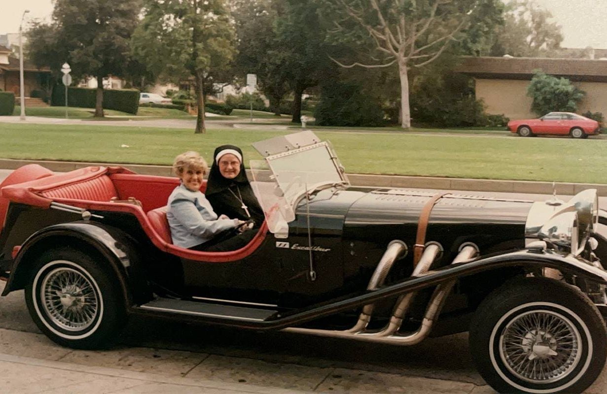 Two people in an old school car. Next Avenue, Erma Bombeck