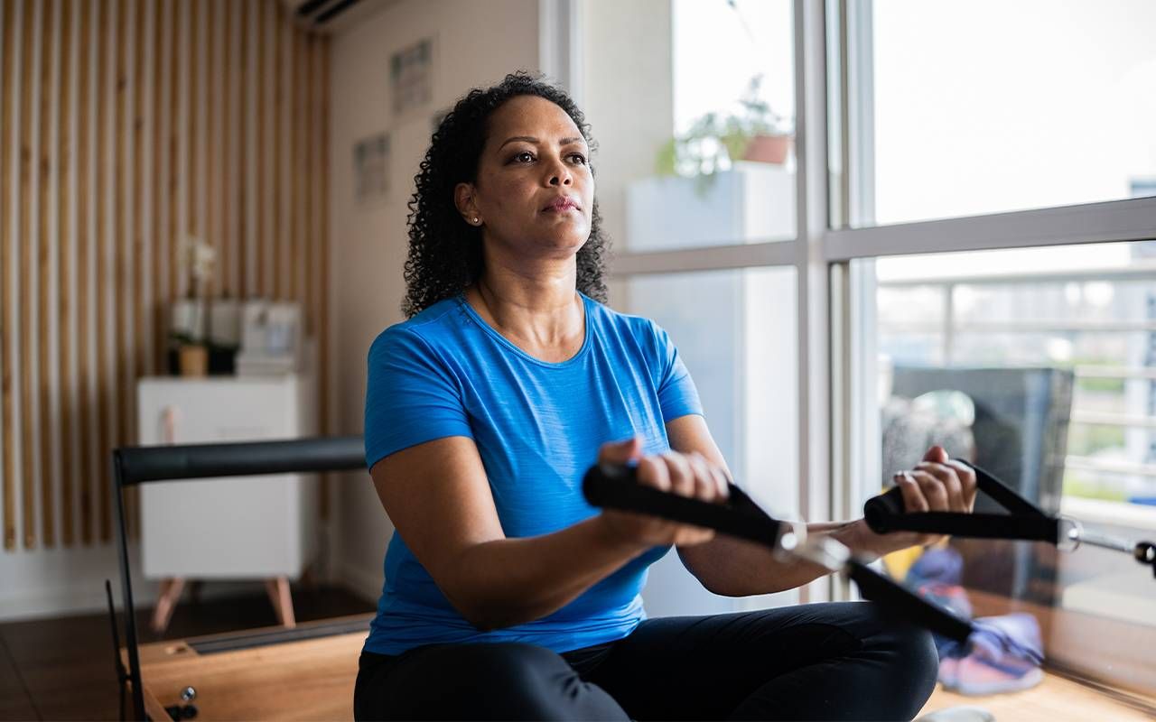 A woman during a Gyrotonic Method class. Next Avenue