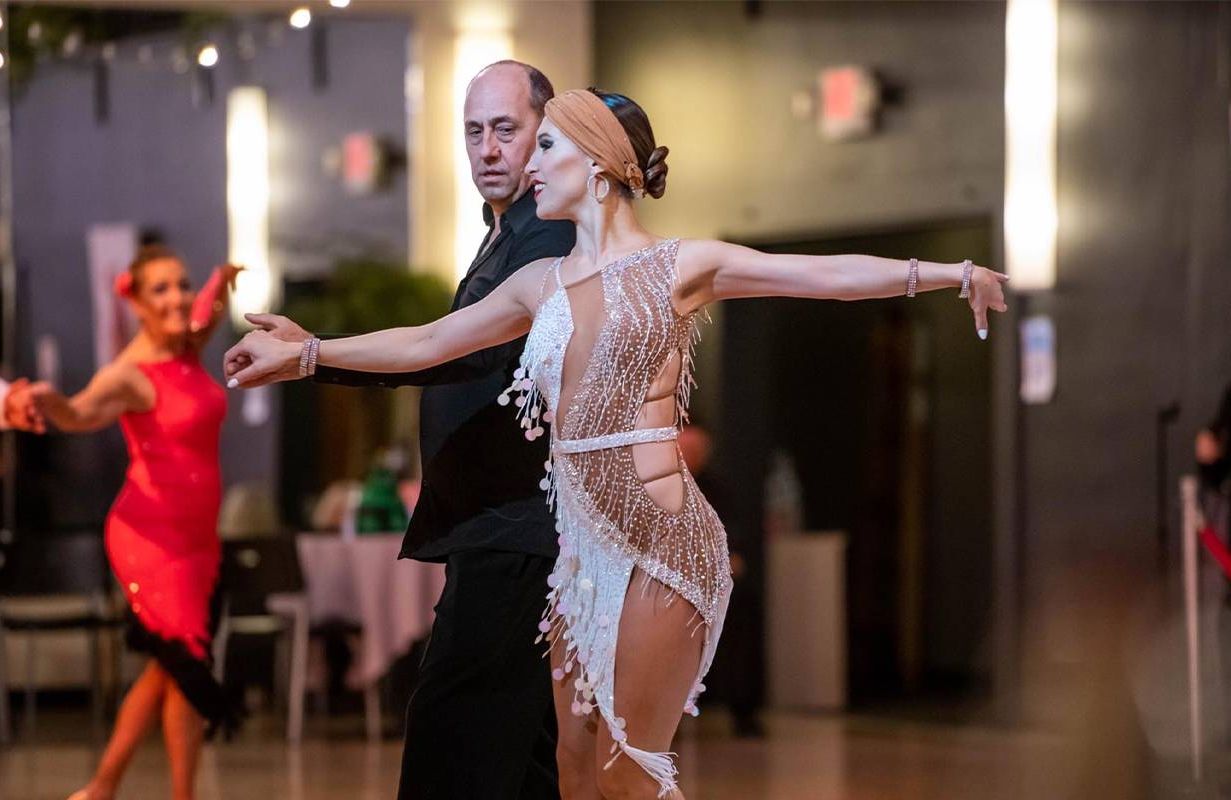 Two people during a ballroom dancing performance. Next Avenue, new habits after retirement
