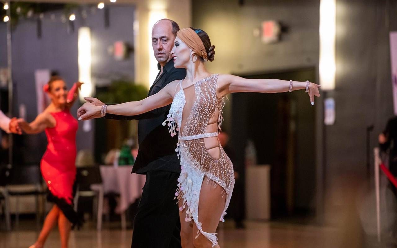 Two people during a ballroom dancing performance. Next Avenue, new habits after retirement