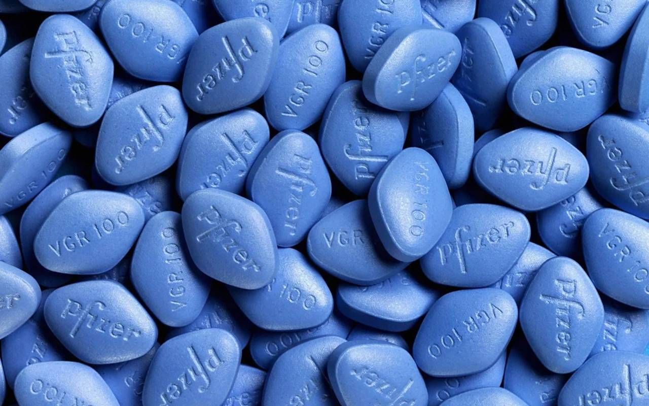 A pile of small blue viagra pills. Next Avenue, viagra, history, 25 anniversary