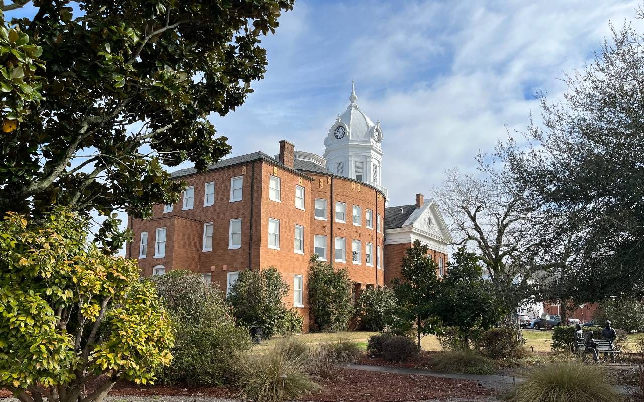 Exterior of a brick courthouse. Next Avenue, Atticus Finch