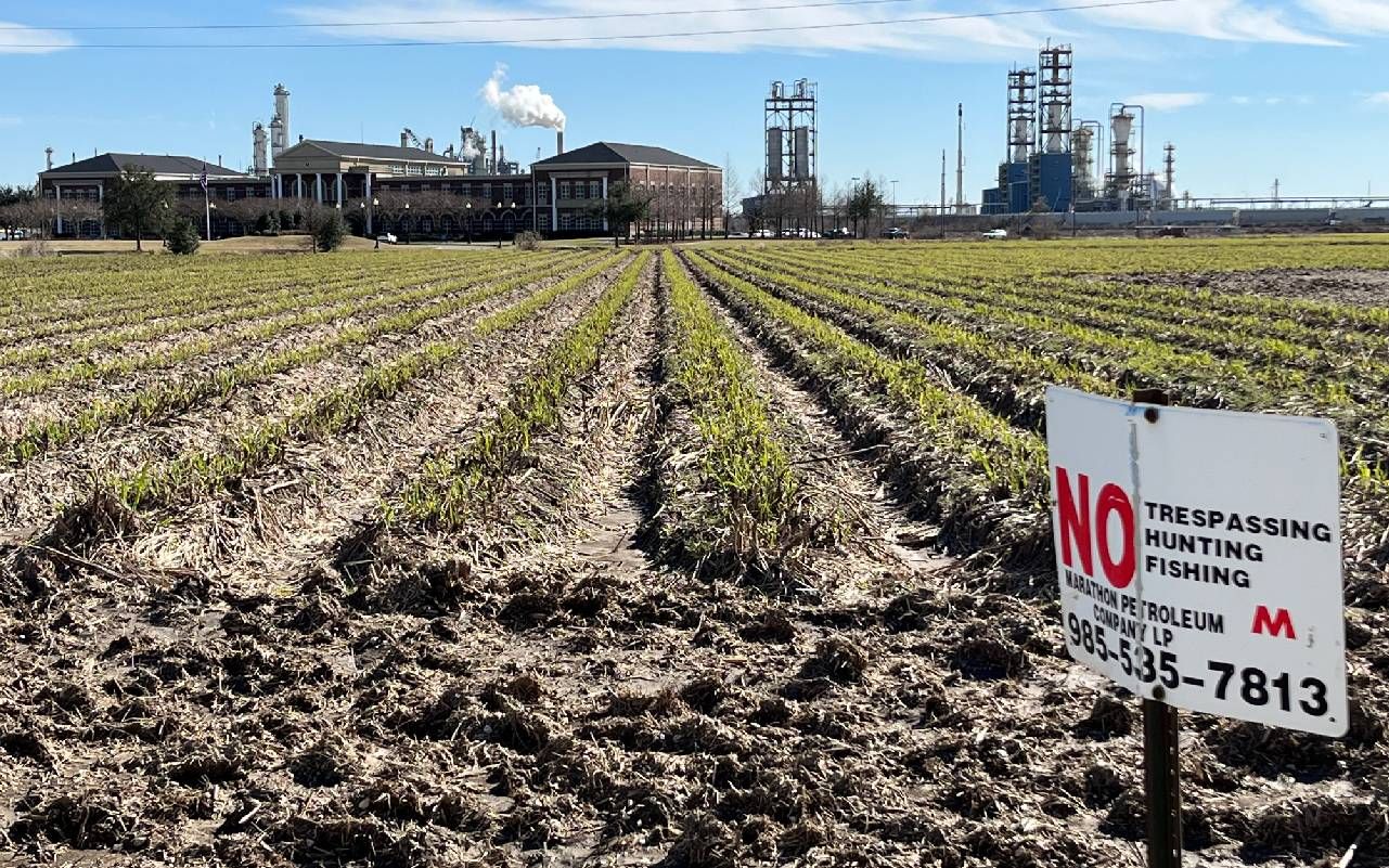 A oil plant next to a farm. Next Avenue, environmental activism, industrial pollution