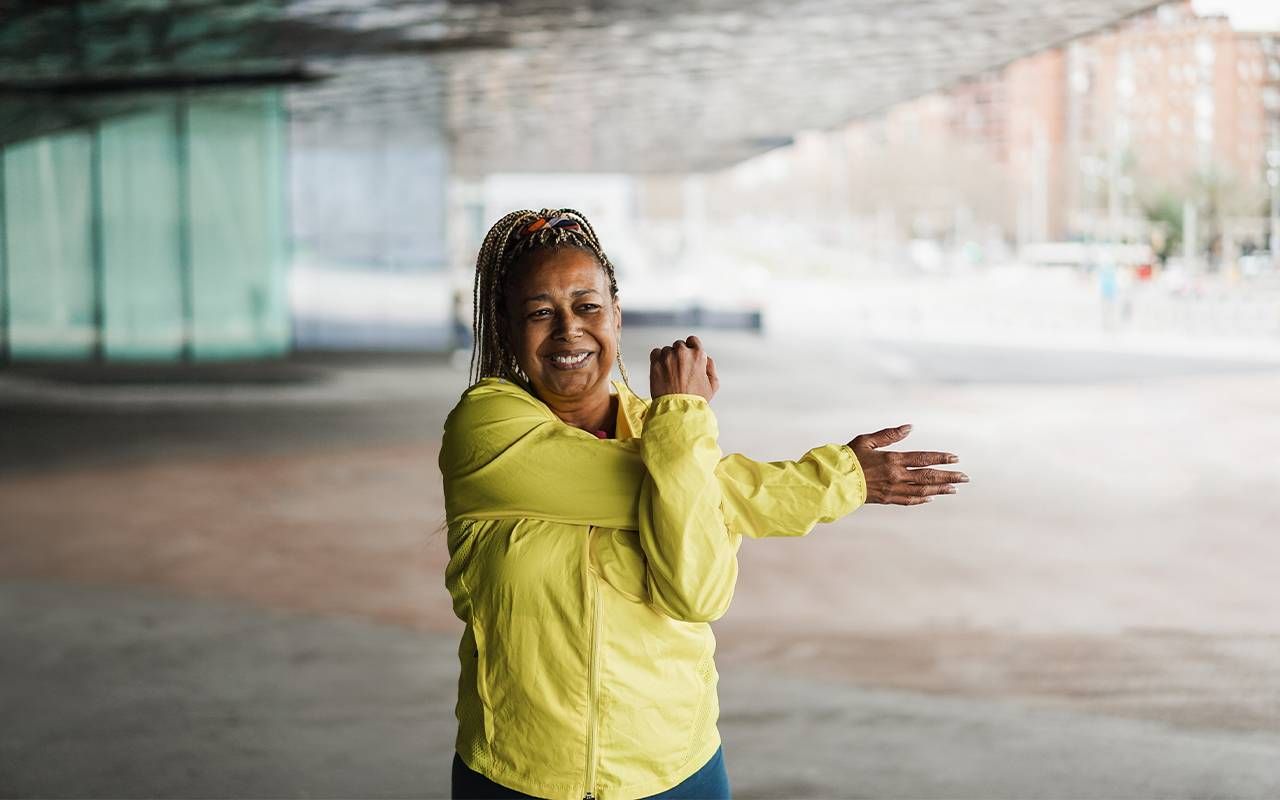 A woman stretching. Next Avenue, flexibility, stretching for older adults