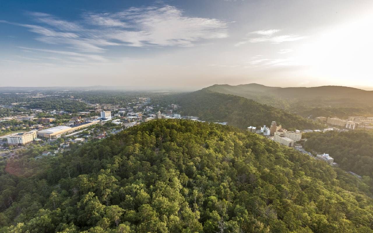 An aerial view of a small town. Next Avenue, travel, hot springs arkansas