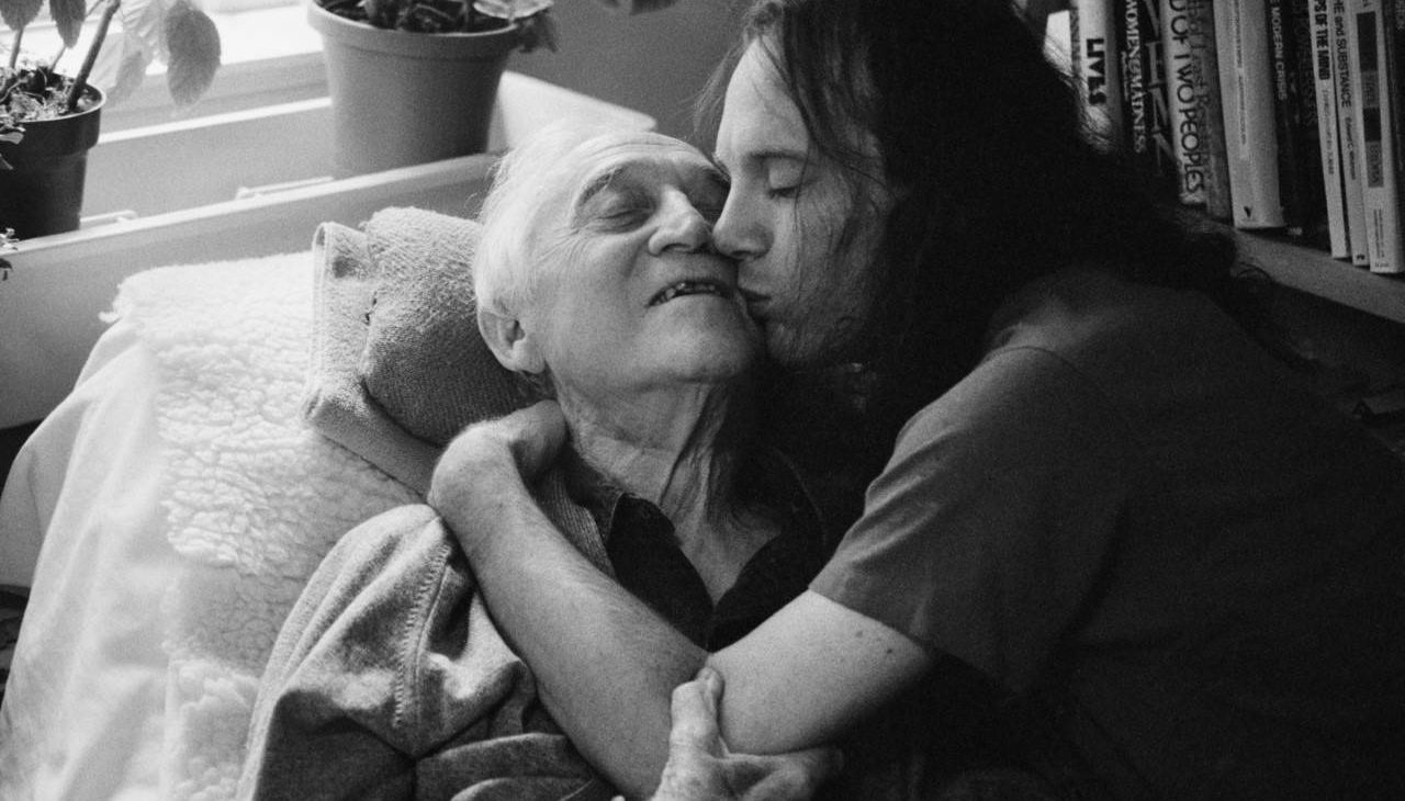 Two people hugging. Next Avenue, tuesdays with morrie