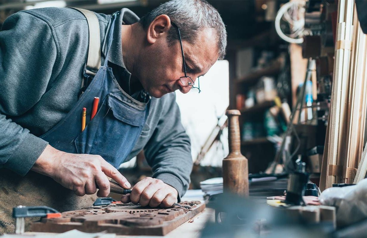 An older craftsman at work. Next Avenue, retirement plan, no retirement savings