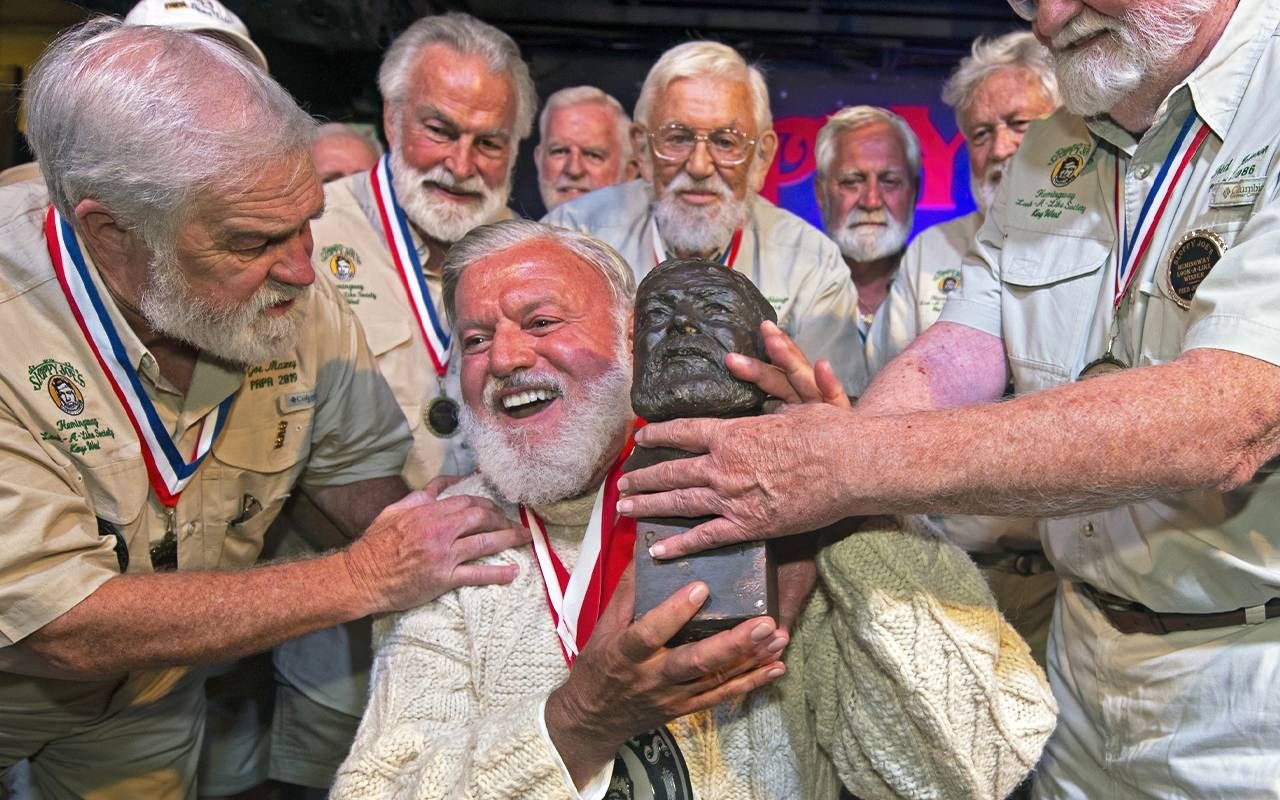 Hemingway look a likes on stage. Next Avenue, summer art festivals, 2023