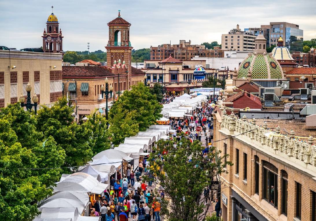 An aerial view of a street festival. Next Avenue, summer art festivals, 2023