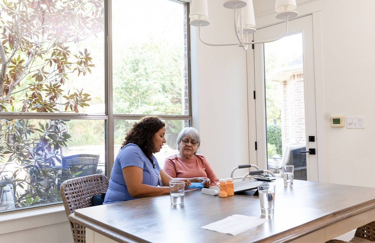 A hospice patient with a nurse at home. Next Avenue, hospice care