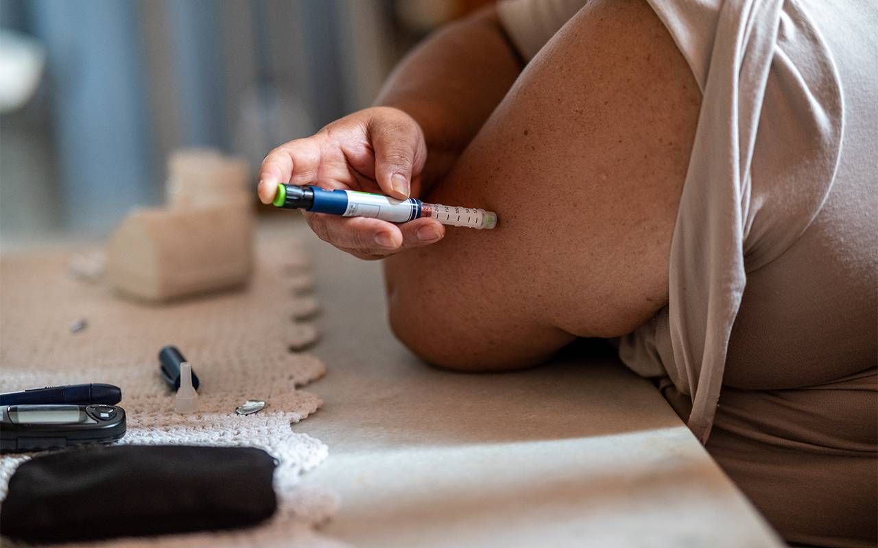 A person taking an insulin shot at home. Next Avenue, diabetes, aging