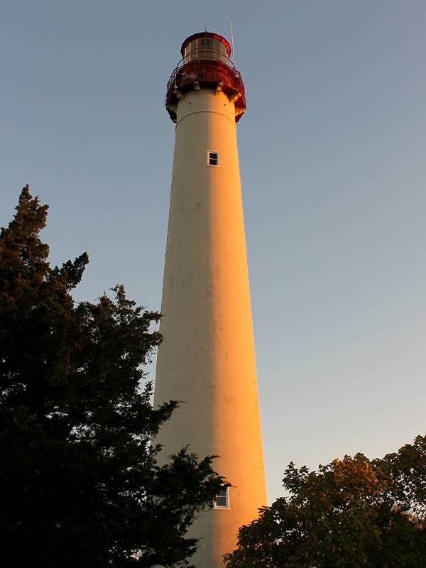 A tall lighthouse. Next Avenue, cape may