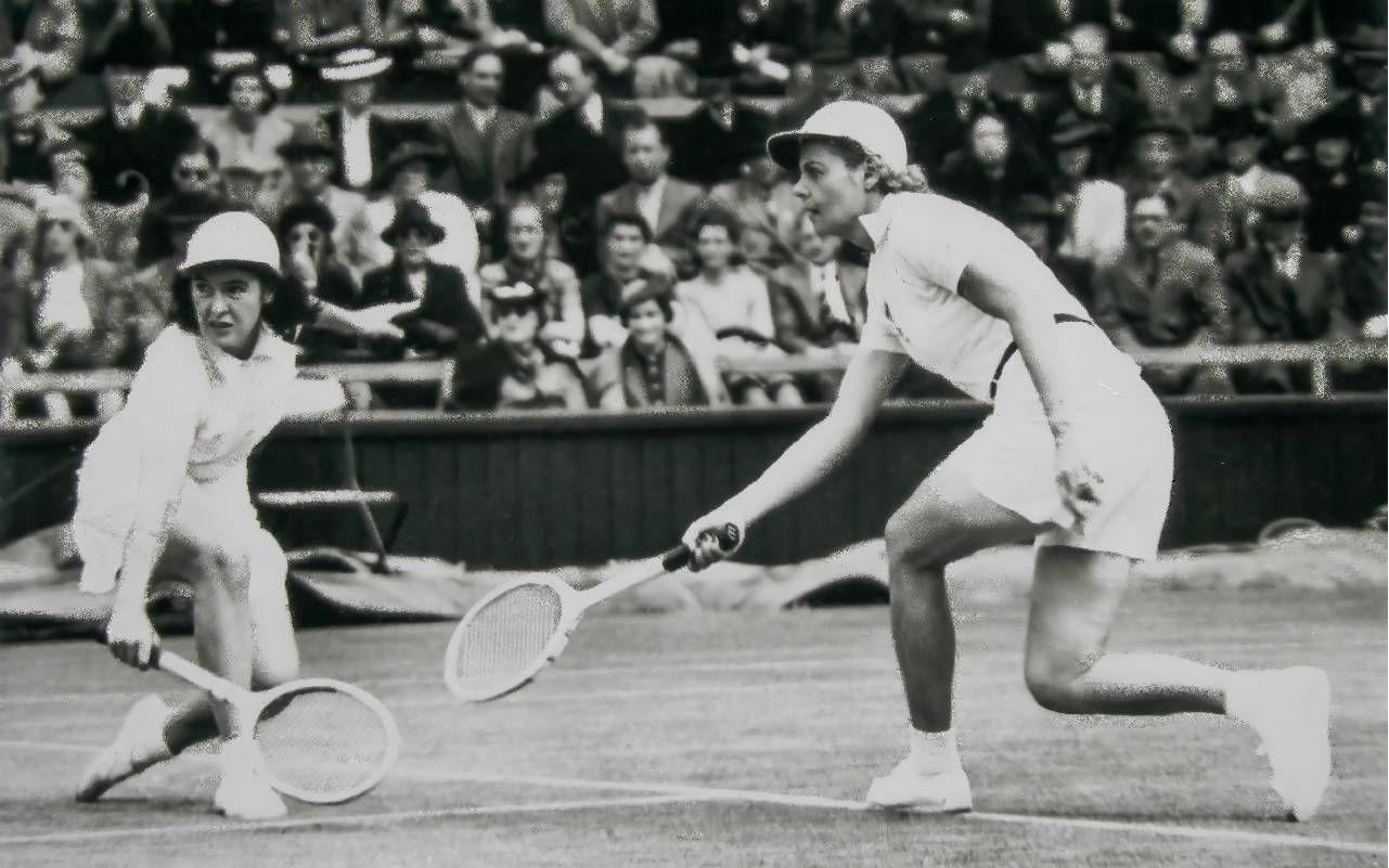 An old photo of two women playing tennis. Next Avenue, Alice, Marble, Queen of the Court, Tennis