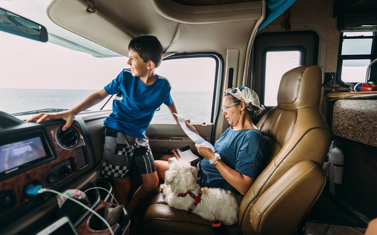 A grandmother and her grandson in an RV during a road trip. Next Avenue