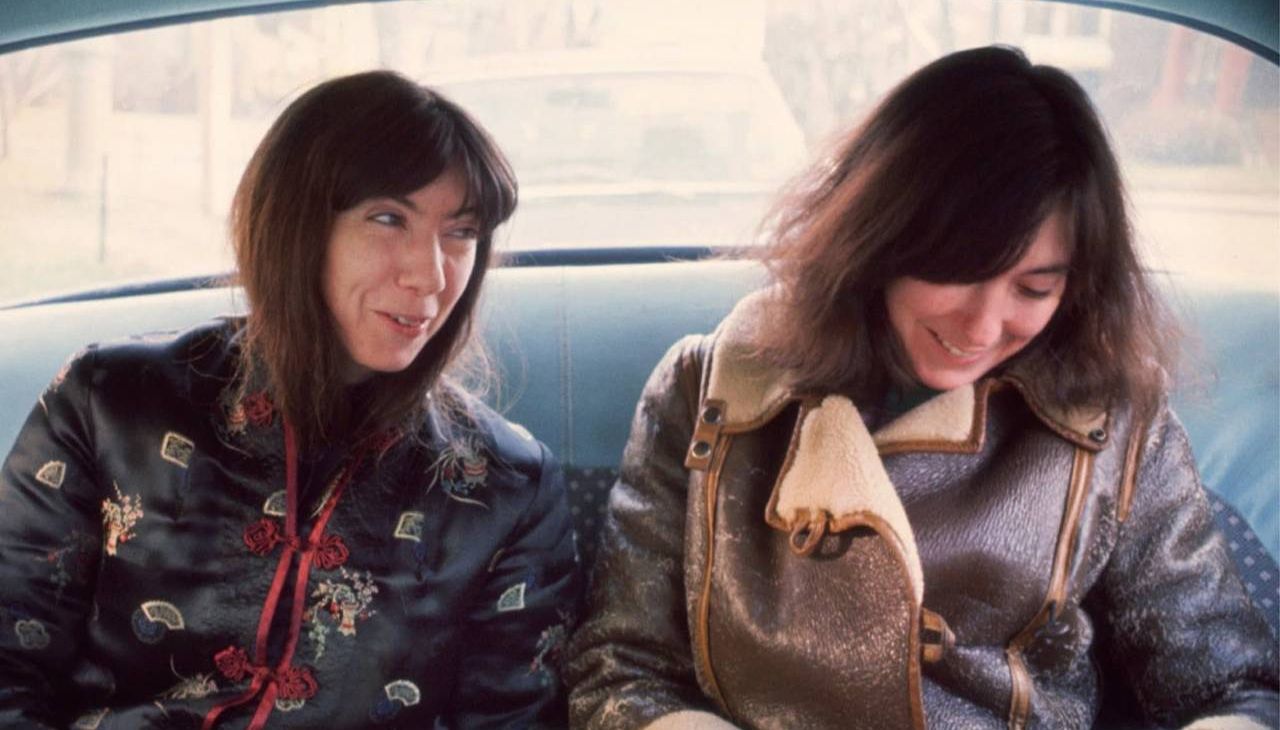 Two sisters laughing together in a car. Next Avenue