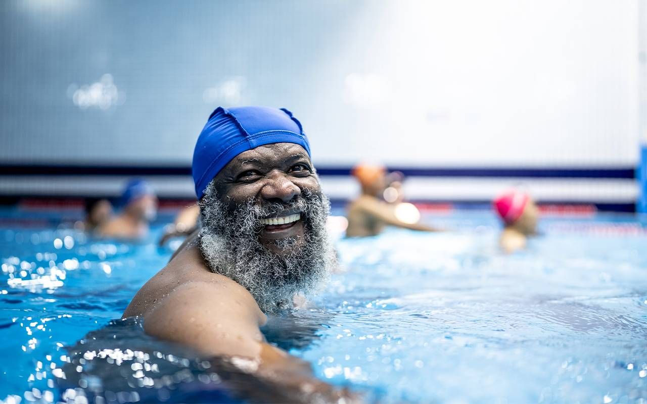 A man swimming in a pool.