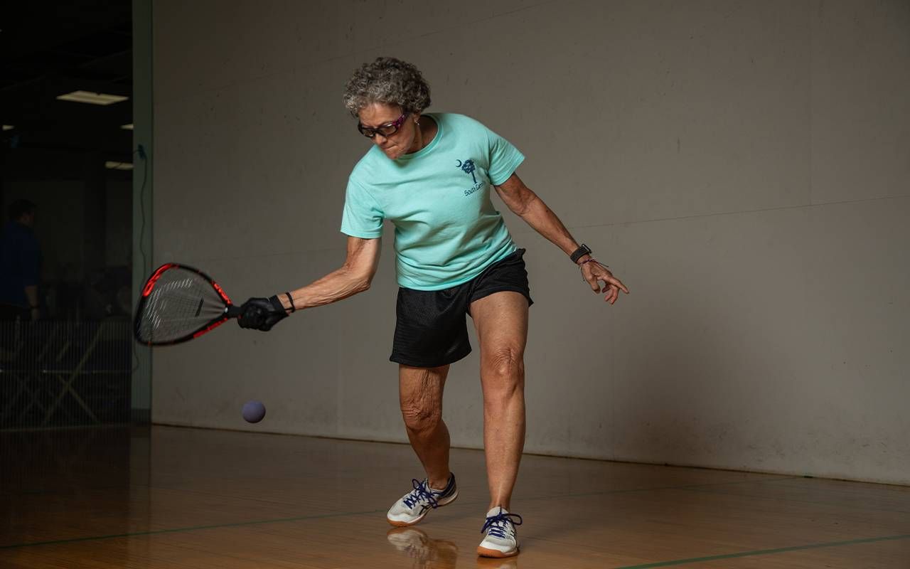 A person playing pickleball. Next Avenue