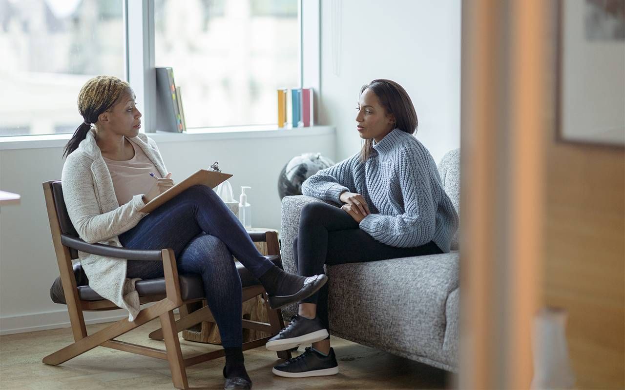 A mental health therapist talking to a client. Next Avenue, caregiving, mental health