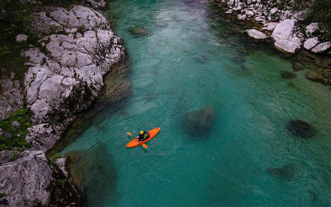 A birdseye view of a person in a kayak. Next Avenue