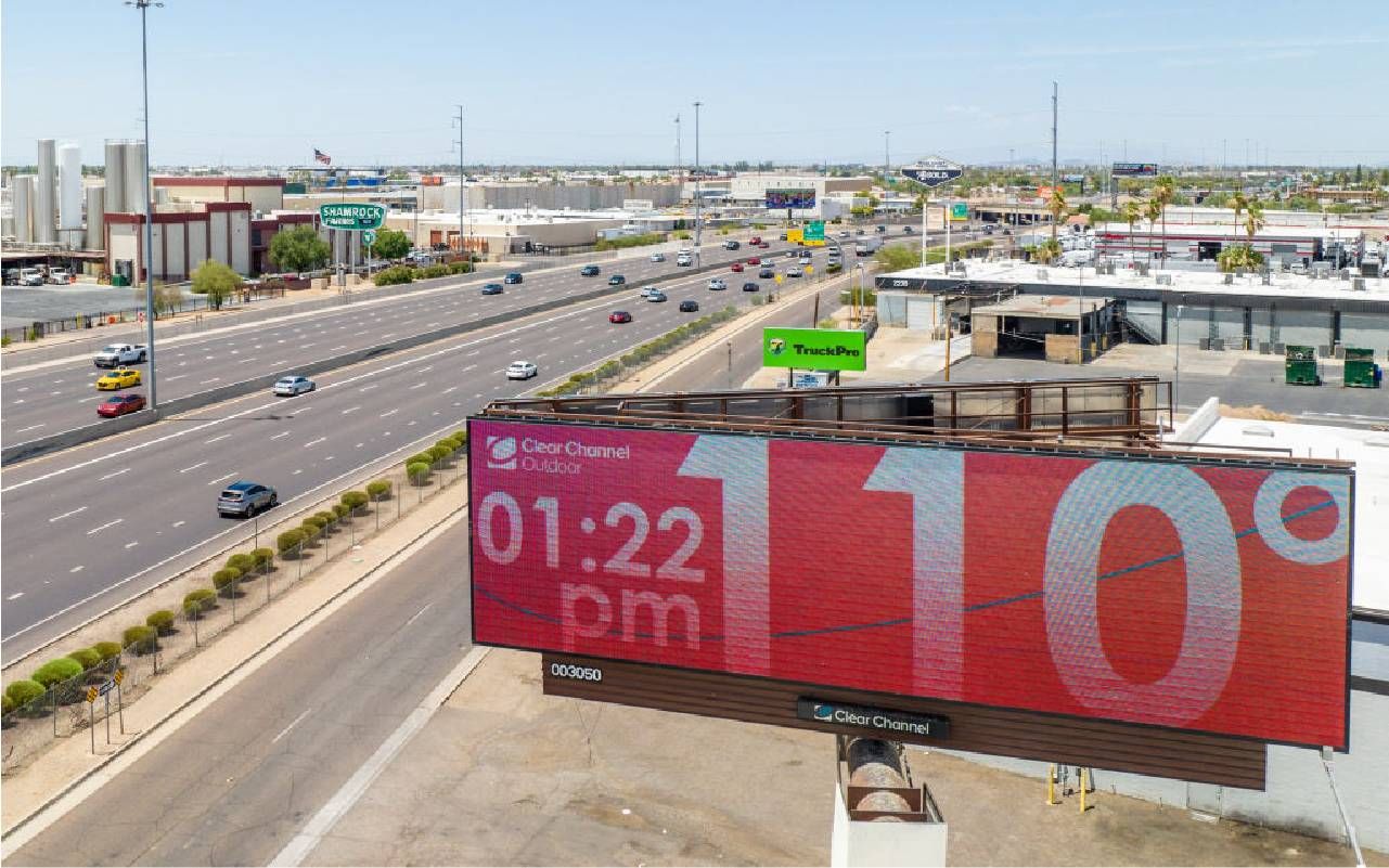 A bilboard in Phoenix, Arizona showing 110 degree temperatures. Next Avenue