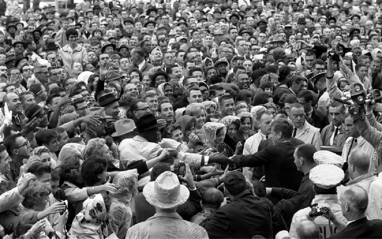 President John F. Kennedy surrounded by a crowd. Next Avenue, Sixty Years jfk Assassination