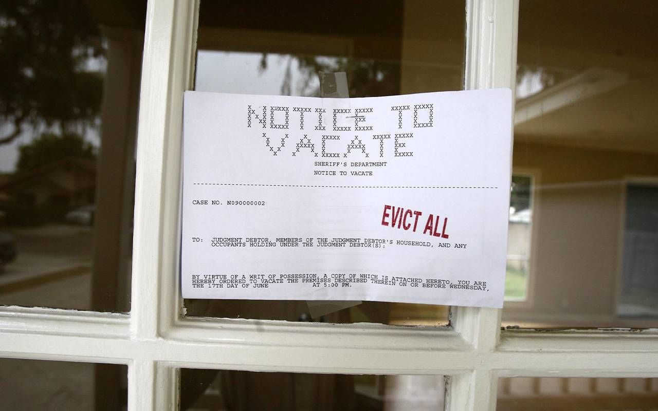 An eviction notice posted on a person's front door. Next Avenue