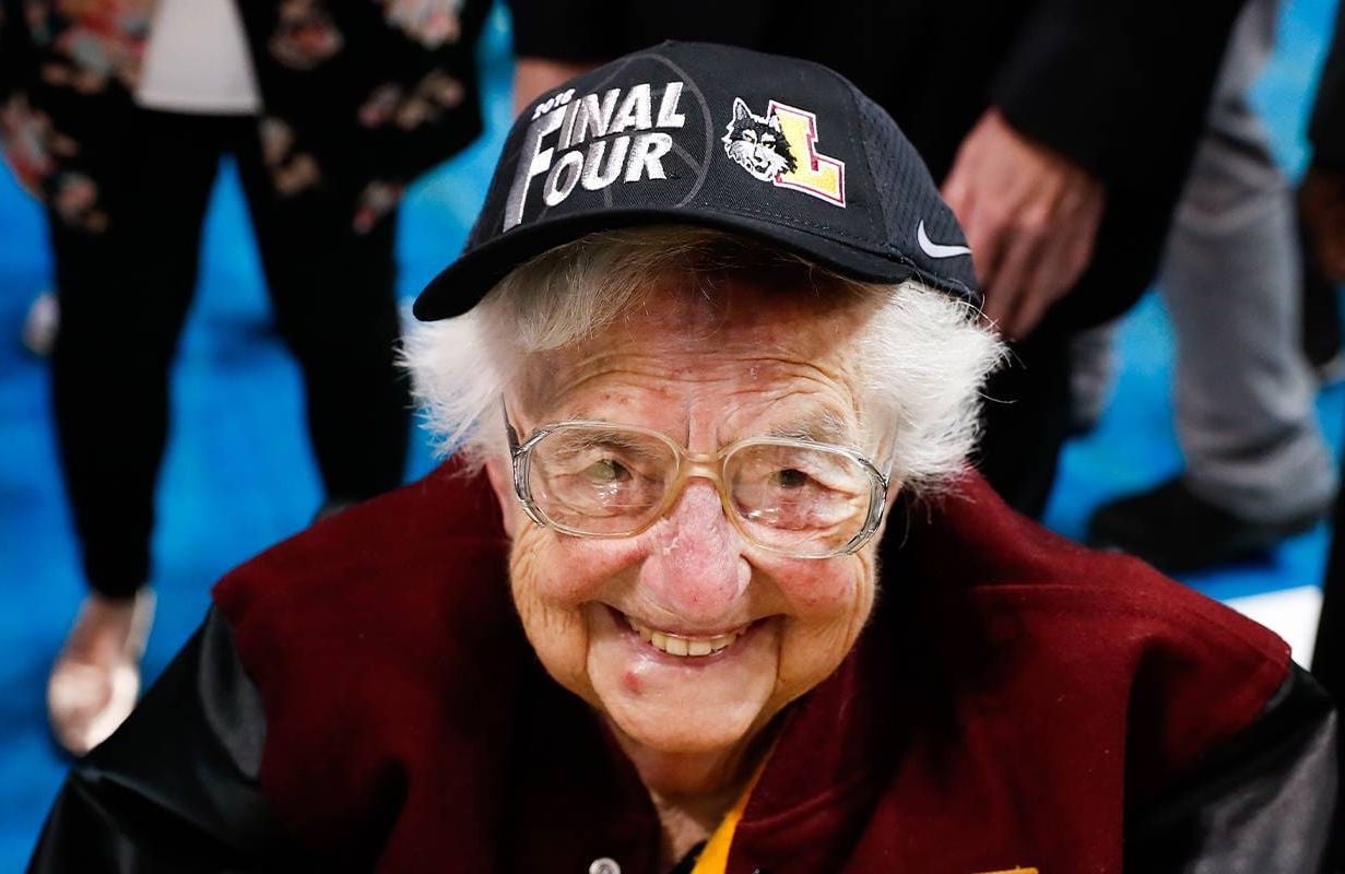 Sister Jean wearing a Final Four hat at a game. Next Avenue