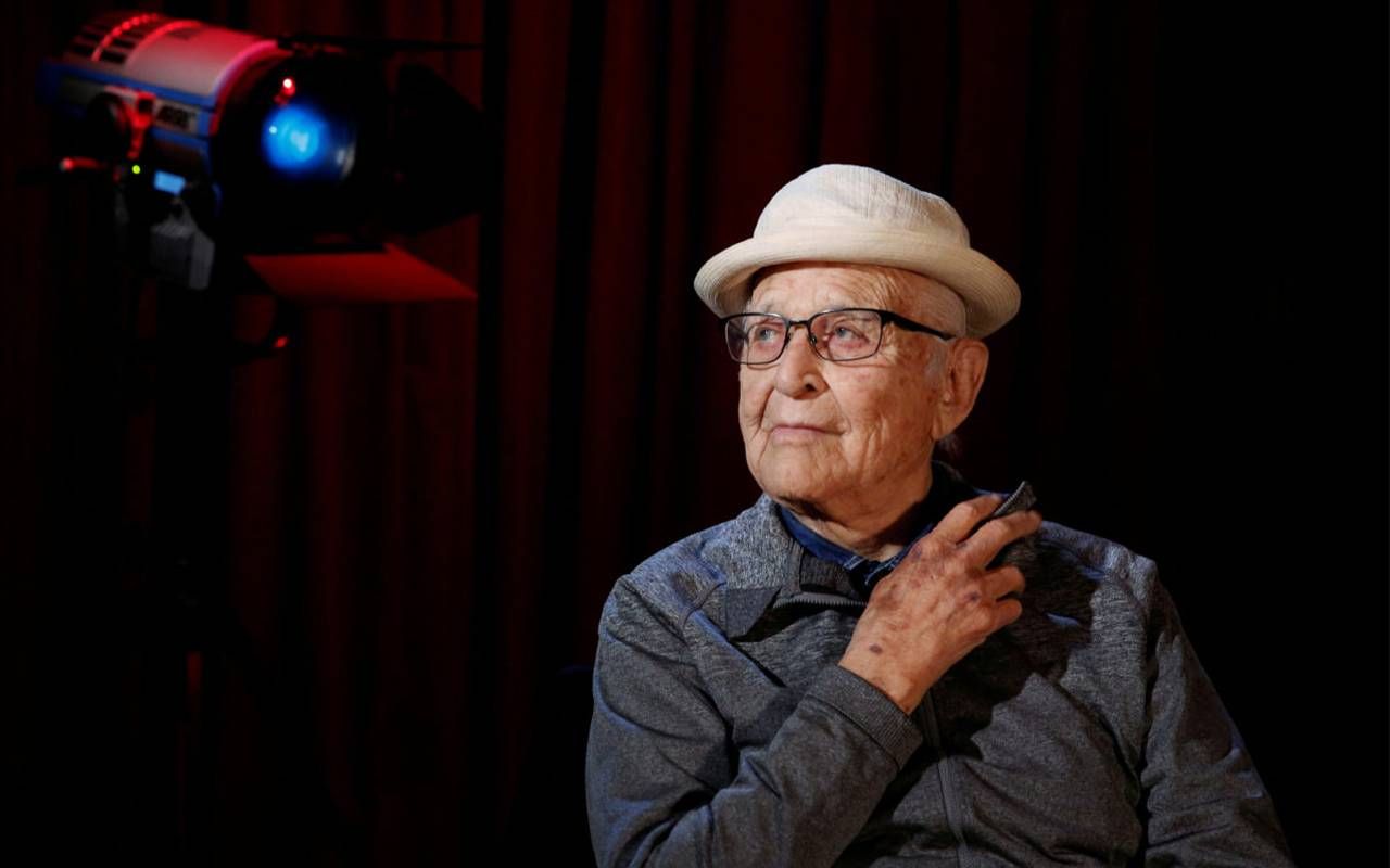 Norman Lear on a set wearing a hat. Next Avenue, Normal Lear