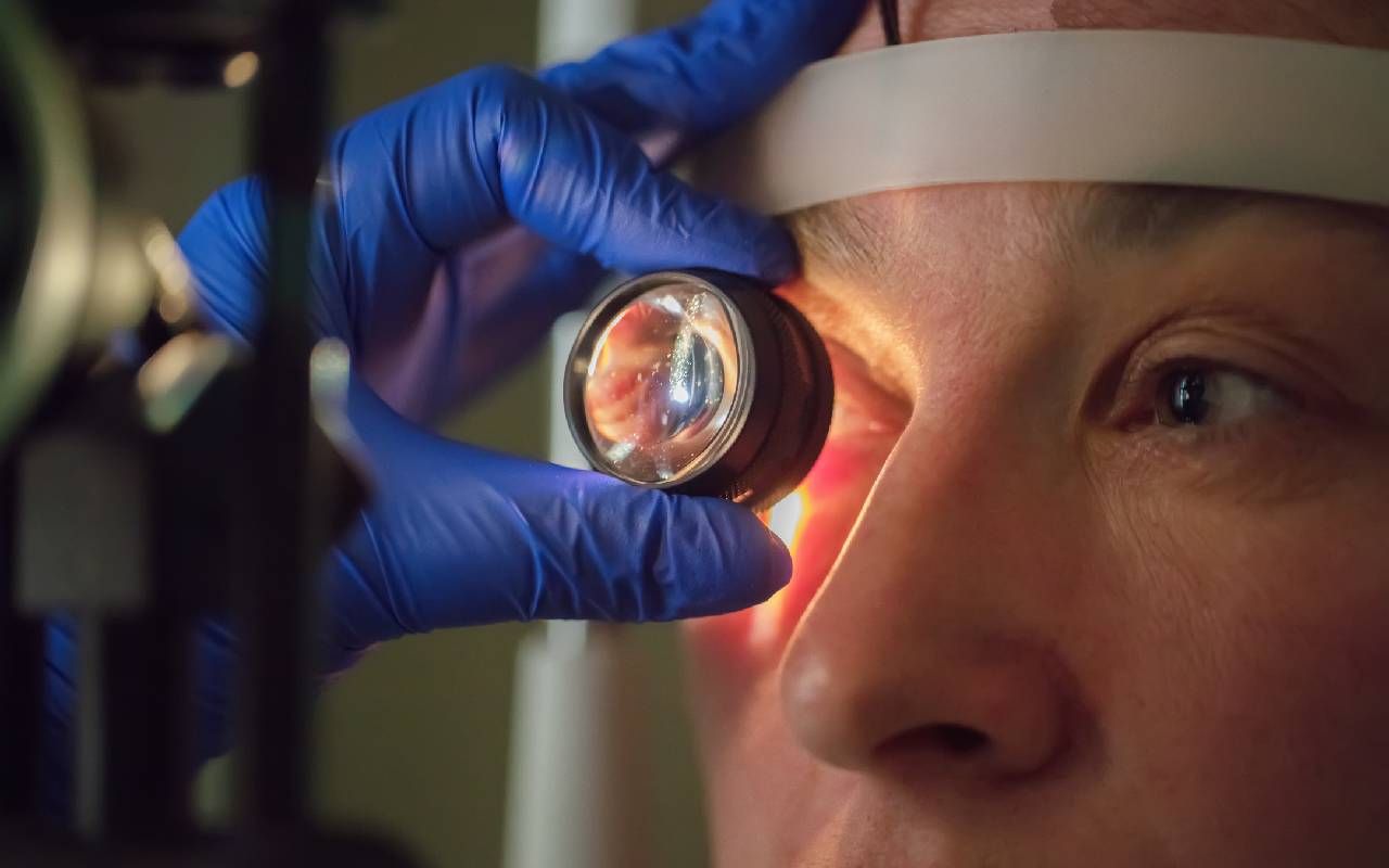 A woman and an ophthalmologist during an appointment. Next Avenue, cataract surgery