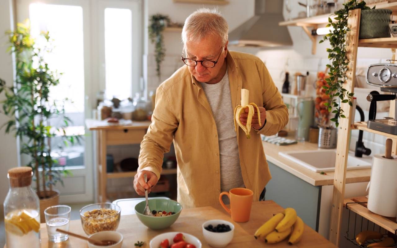 A man with high cholesterol making a healthy breakfast. Next Avenue