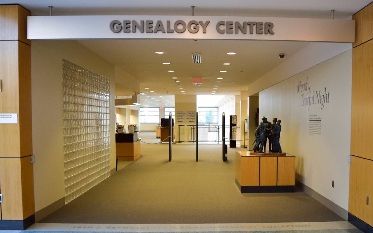 The entrance of the Genealogy Center inside a public library. Next Avenue, family history, research
