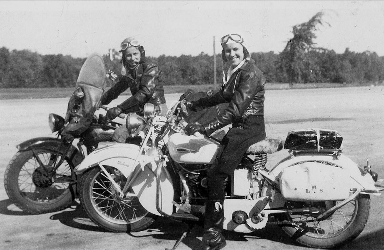 A black and white photo of two women on motorcycles. Next Avenue