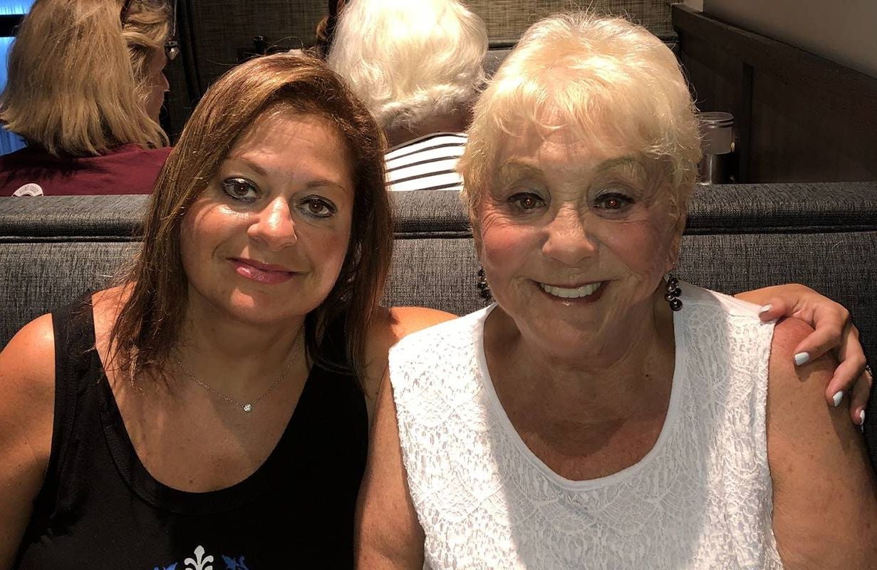 Two women smiling in a restaurant. Next Avenue, probate, heirs, estate planning