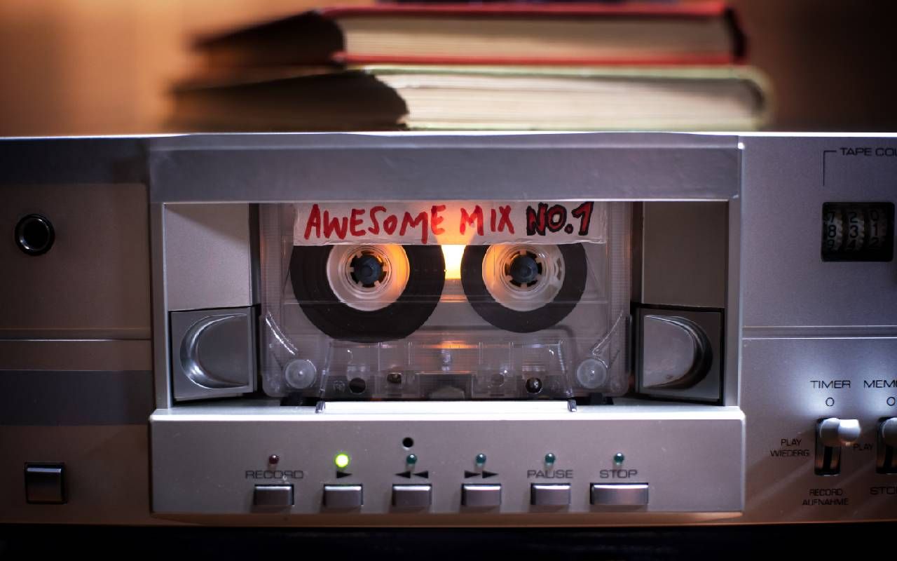 A closeup of a cassette tape being played in a boombox. Next Avenue, Marc Masters