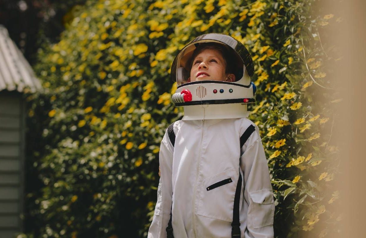 A kid dressed as an astronaut, dreaming about his future career. Next Avenue