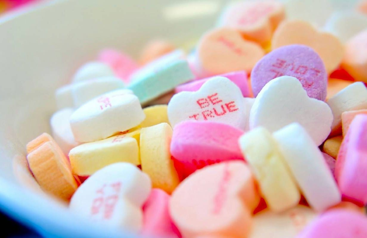 Candy hearts in a bowl. Next Avenue, caregiving